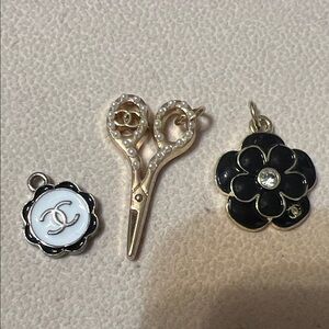 Elegant Gold and Black Brooch Trio